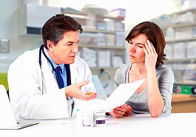 Medical Doctor man and patient woman in hospital-stock-photo